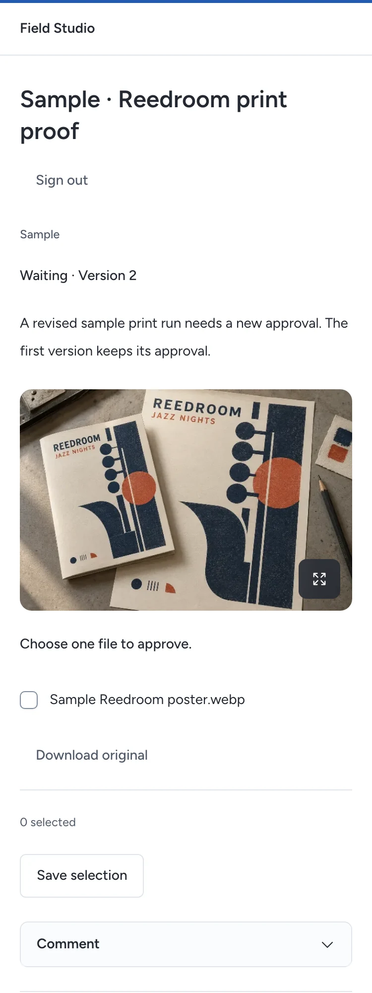 A customer reviews the second version of a sample print proof