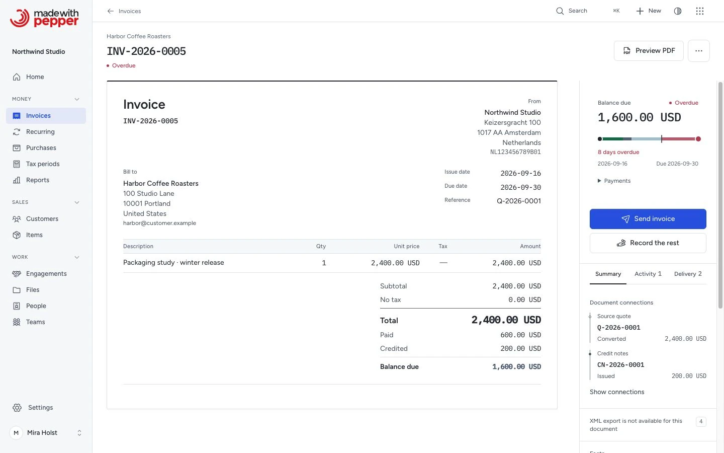 Issued USD invoice with its saved lines and remaining balance